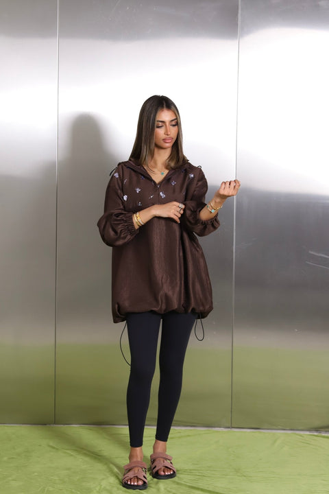 Cocoa brown oversized hoodie with silver floral embroidery and elastic cuffs by Timeless Boutique Kuwait