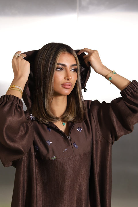 Cocoa brown oversized hoodie with silver floral embroidery and elastic cuffs by Timeless Boutique Kuwait